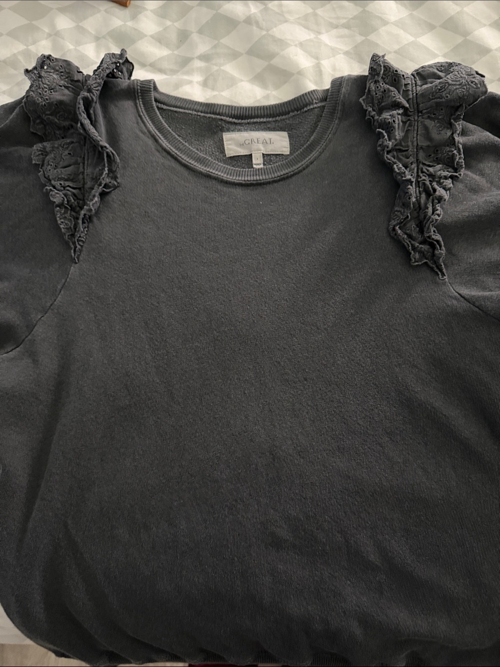 THE GREAT. Black Ruffle-Shoulder Sweatshirt